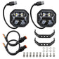 Two off-road vehicle lights with wiring harnesses and mounting brackets on a white background