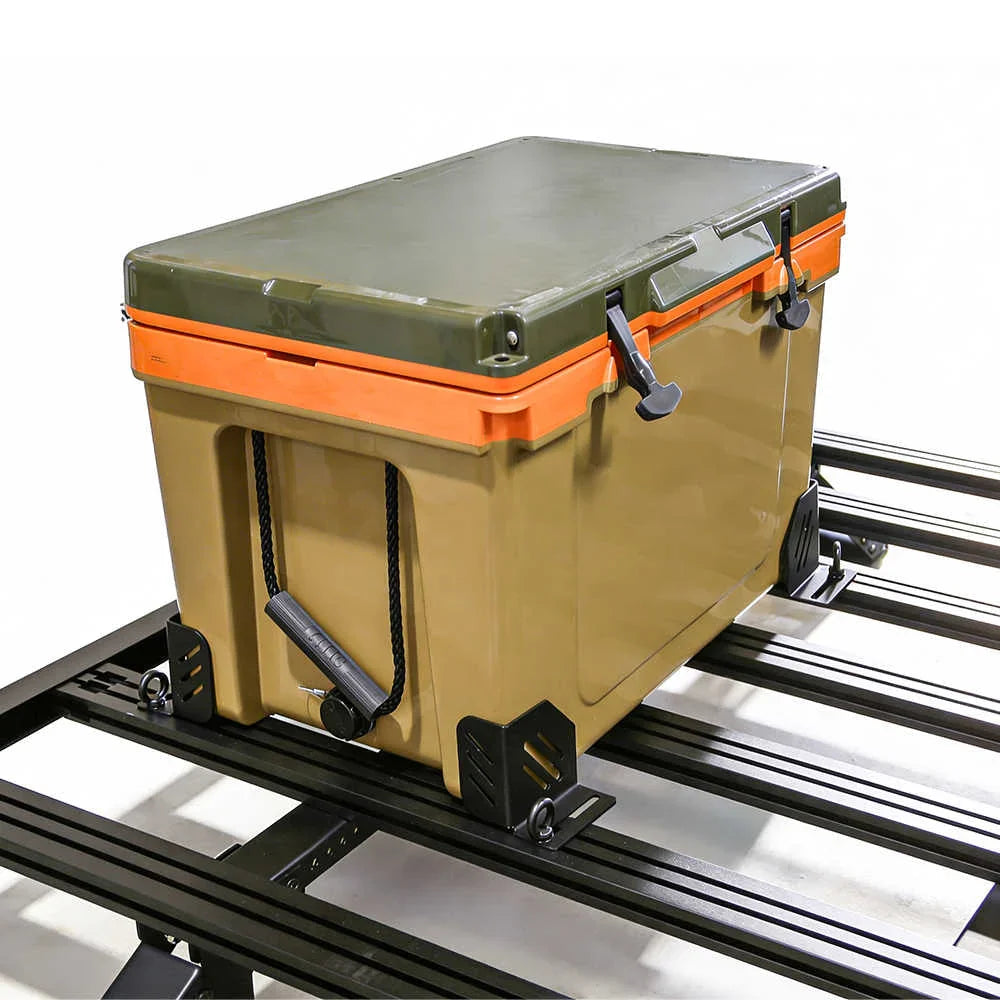 Cooler box with green lid and orange sides on a metal rack with brackets