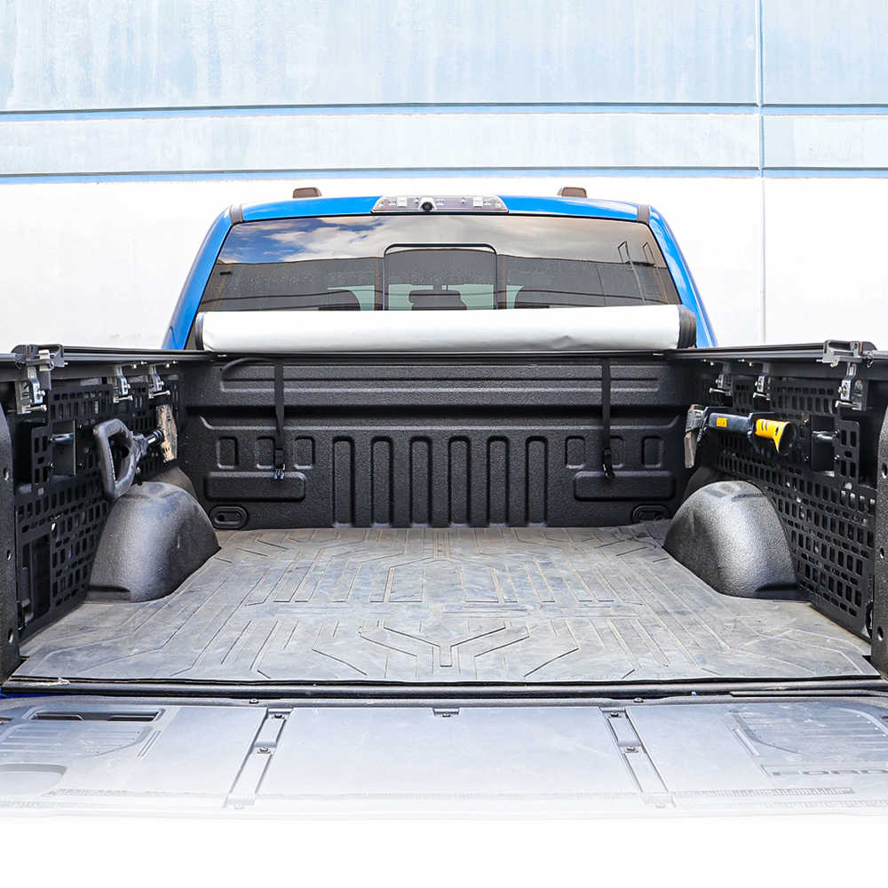 Truck bed with a soft roll tonneau cover with bedside panel installed in an open cargo area