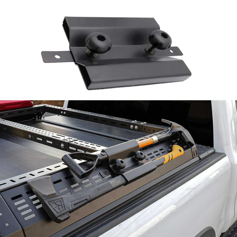 Black metal bracket on a white background with a truck bed rack in the foreground.