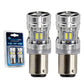 Two silver and black SYNETICUSA LED light 1157 bulbs shown next to their blue and white retail blister packaging on a white background.