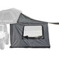 Gray outdoor canopy tent attached to a vehicle on a white background