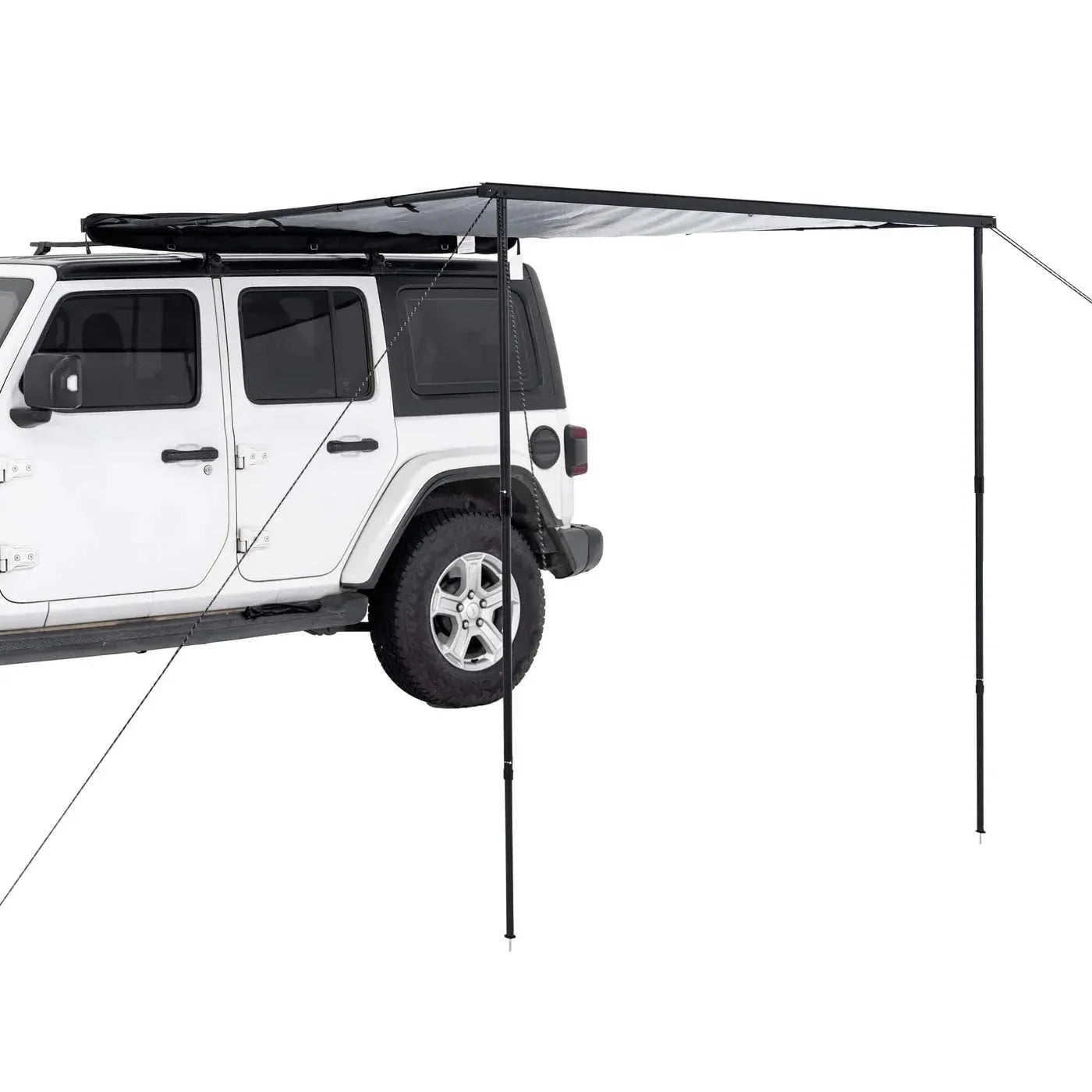 White SUV with a black side awning tent on a white background