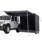 White Jeep Wrangler with a black camping tent attached to it on a white background