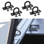 Set of black metal brackets with bolts on a white background, shown with a vehicle roof rack.