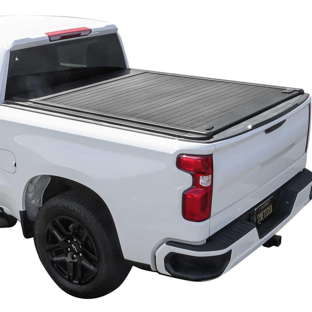 White truck with Enhanced MB retractable tonneau cover on a white background