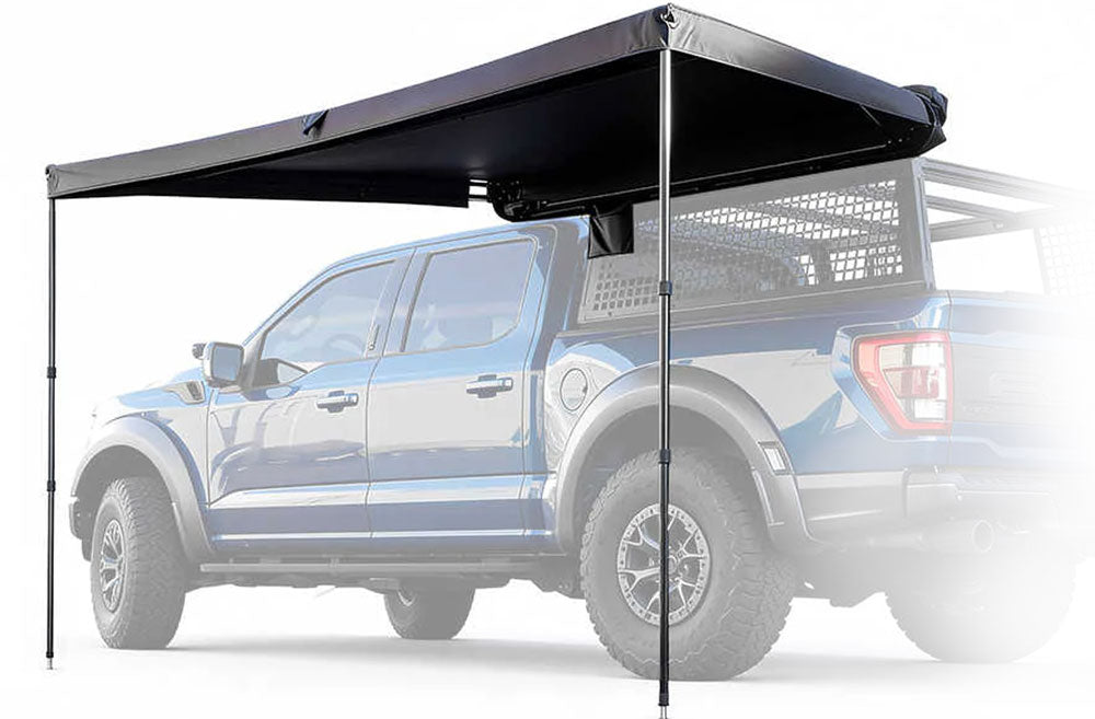 Black truck bed cover attached to a pickup truck on a white background