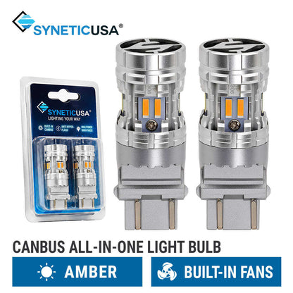 Two silver Syneticusa canbus all-in-one 3157 3156 light bulbs shown next to their blue retail blister packaging, with text highlighting amber light and built-in fans.