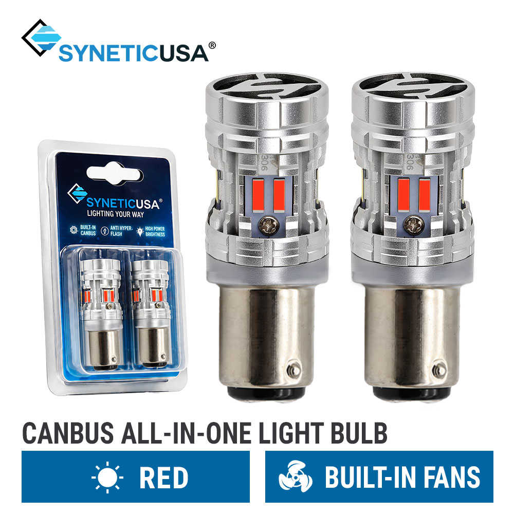 Two silver SyneticUSA canbus all-in-one 1157 LED light bulbs with built-in fans and red accents, shown alongside their blue retail blister packaging on a white background.