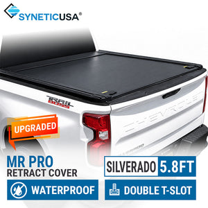A black Synetic USA MR Pro retractable truck bed cover installed on the bed of a white Chevrolet Silverado 5.8 ft, shown from the rear three-quarter angle with promotional text overlays.