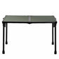 A folding table with a dark green perforated top and black metal legs.