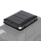 Black roof box on a vehicle with a white background