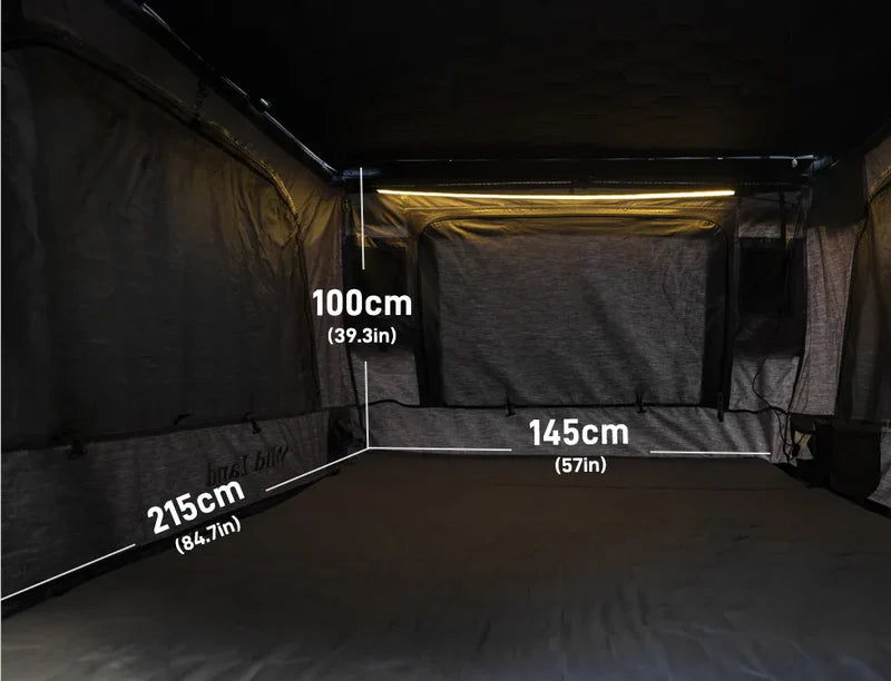 Measurement of a tent interior with dimensions labeled in centimeters and inches.