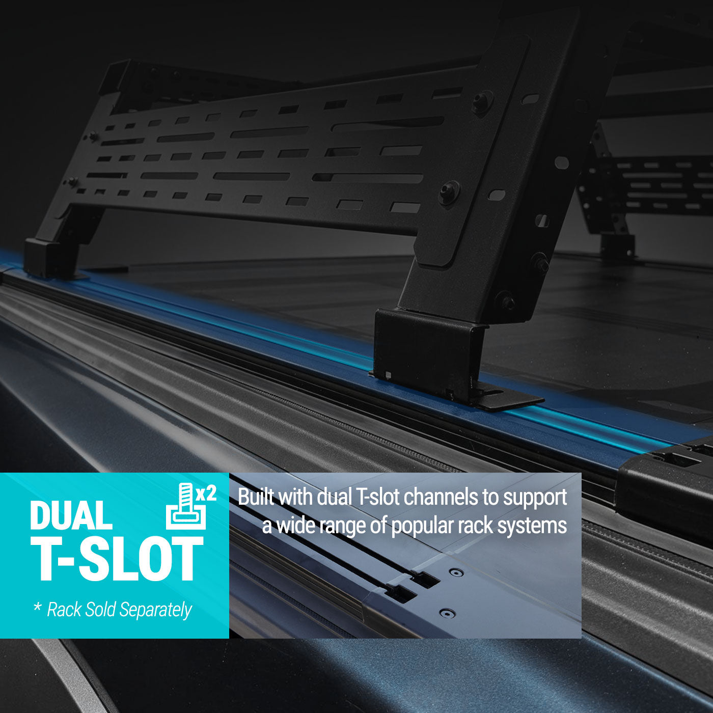 Close-up of a black metal rack system mounted over a blue-gray vehicle bed liner, with overlaid text reading 'DUAL T-SLOT' and 'Built with dual T-slots channels to support a wide range of popular rack systems.'.