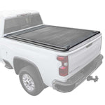 White truck with a black tonneau cover on a white background