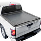 White truck with a black tonneau cover on a white background