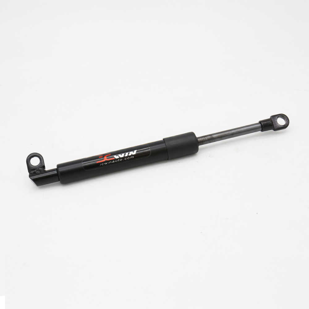 Black shock absorber with a brand logo on a white background