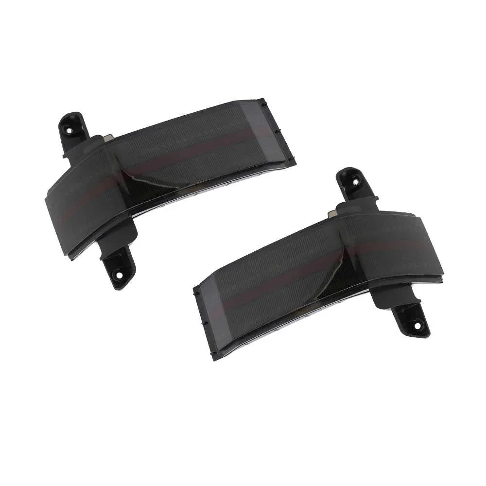 Two black side mirror blinkers with red stripes on a white background
