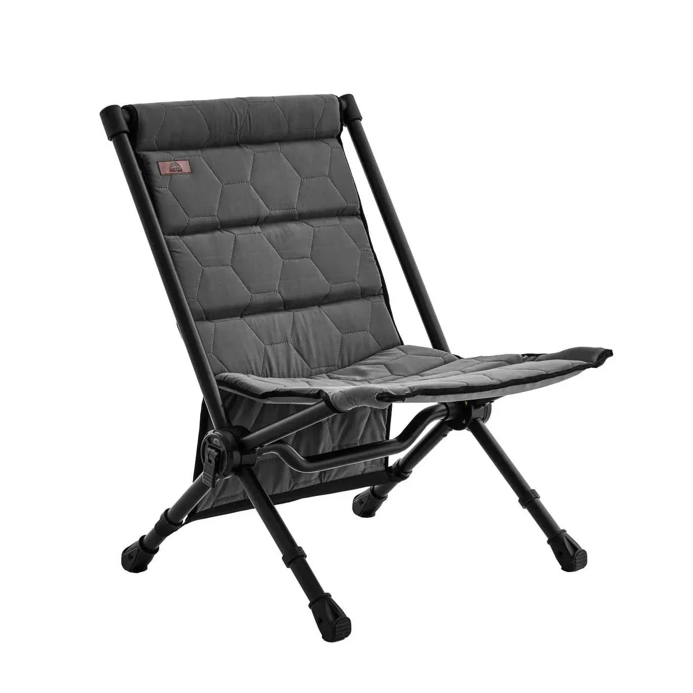 Black camping chair with quilted design on a white background