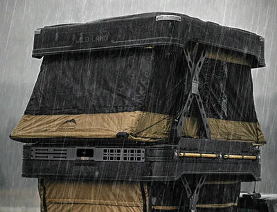 Covered vehicle with a rain cover in a rainstorm