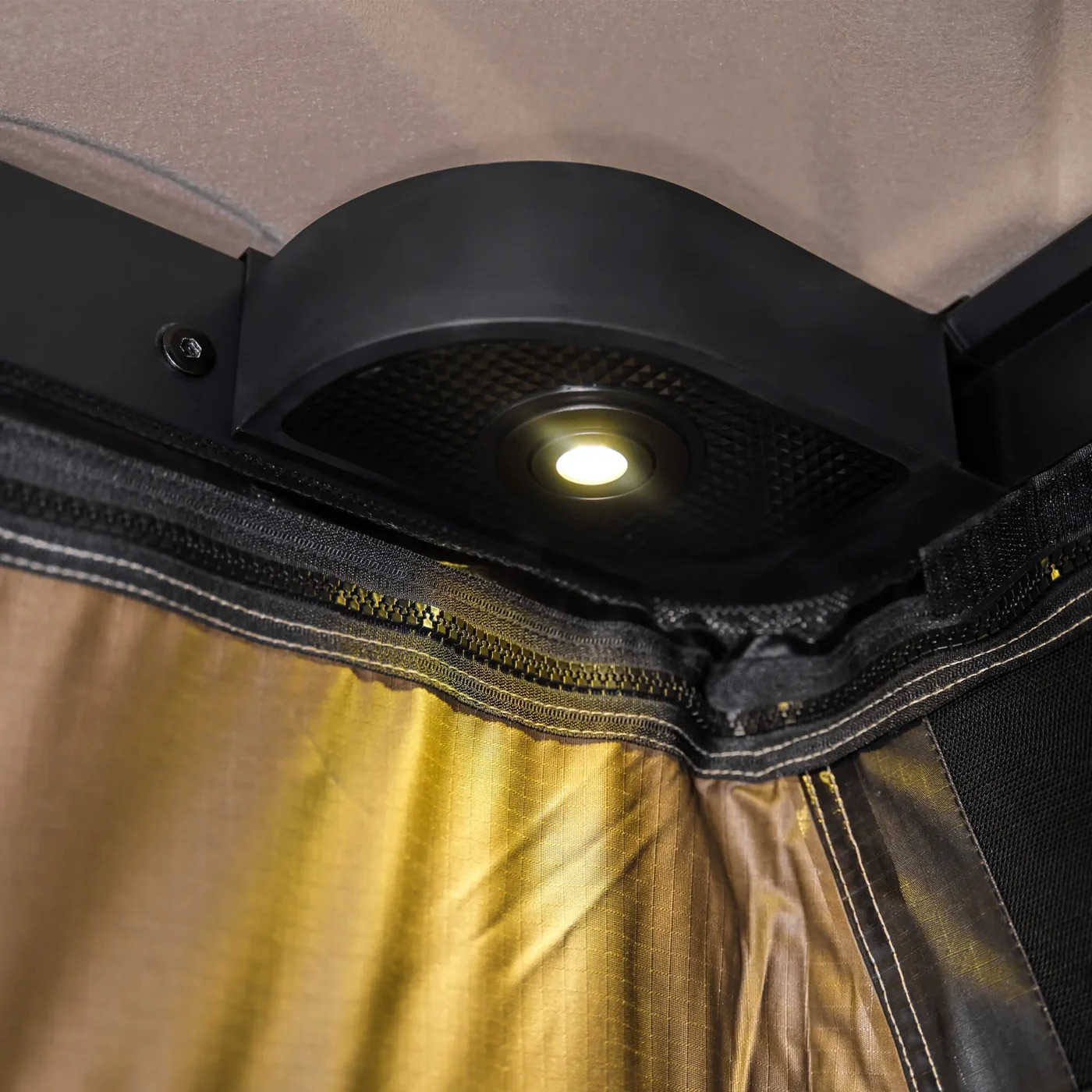 Close-up of a WingmanX's open roof with a light inside, showing the interior design and materials.