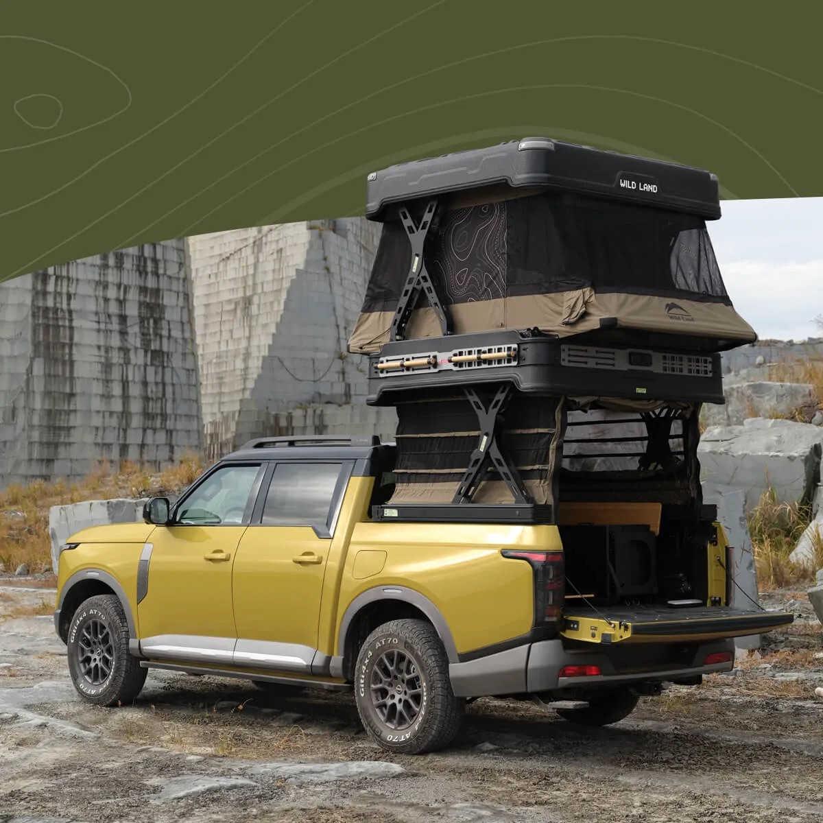 Yellow SUV with a WingmanX rooftop tent in a rocky outdoor setting