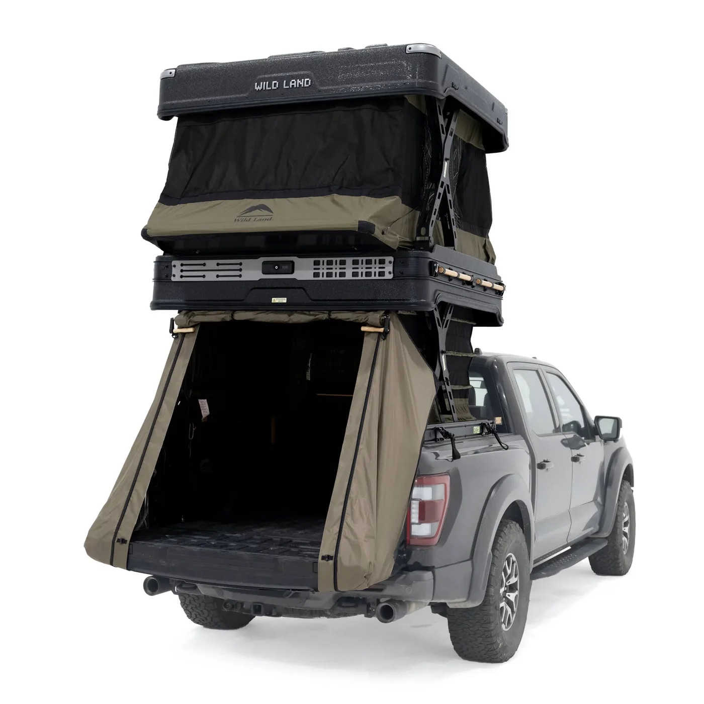 Camper shell on a truck with 'Wild Land' branding on a white background