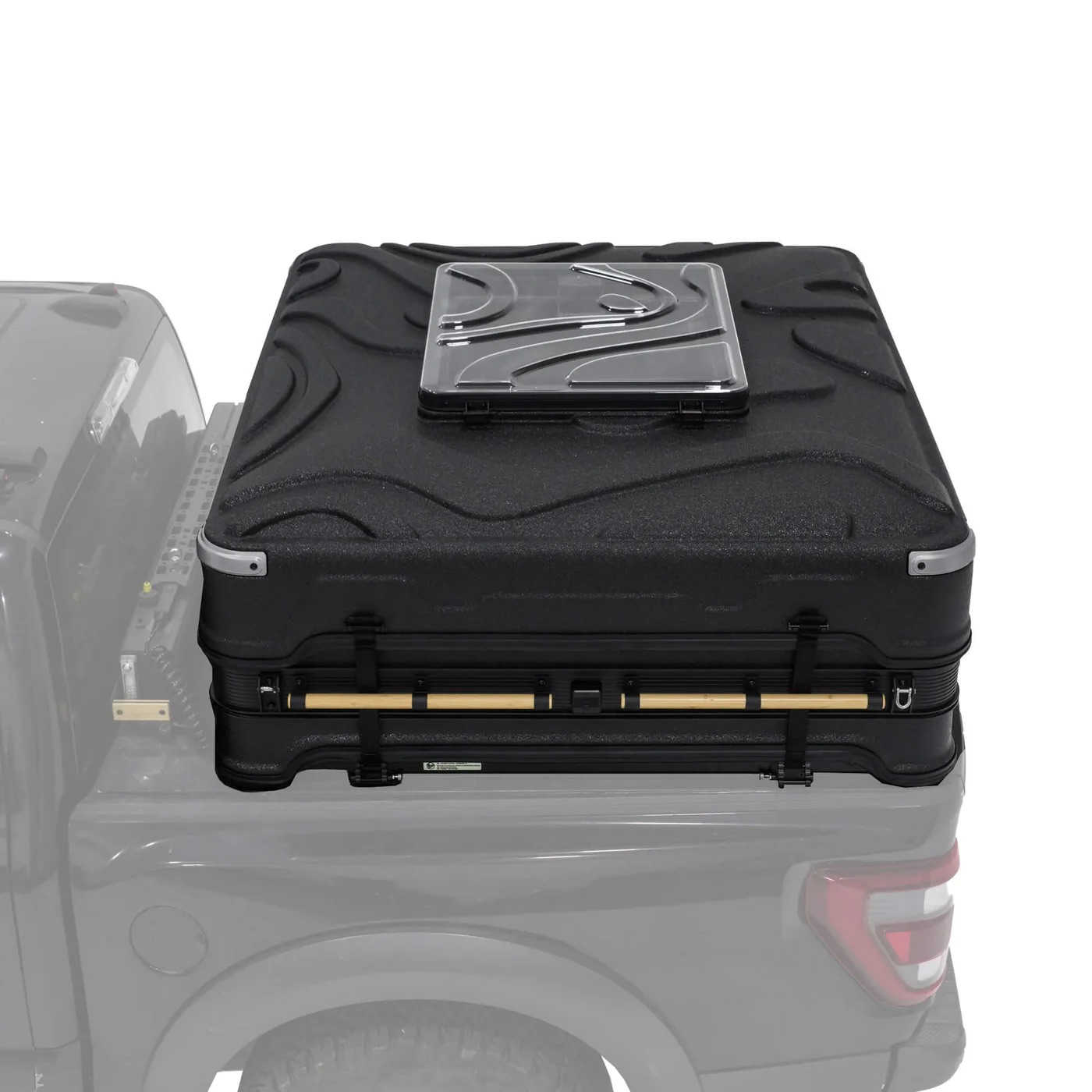 Black roof box on a vehicle with a white background