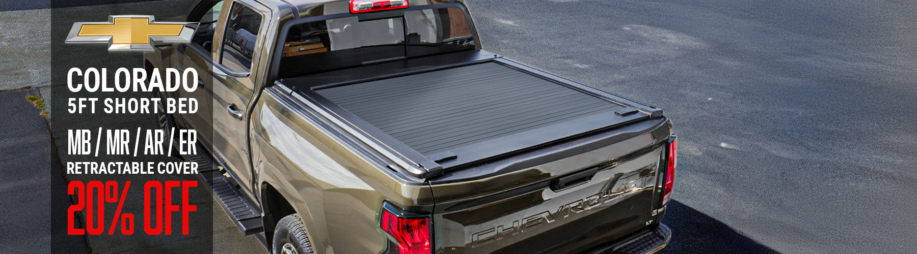 Chevrolet Colorado truck with a retractable cover on a road, promotional text overlay.