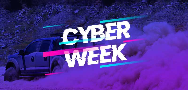 Off-road vehicle in a snowy landscape with 'CYBER WEEK' text overlay.