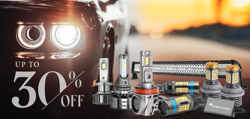 Car headlights with LED bulbs and promotional text 'Up to 25% off' on a dark background.