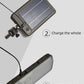 Solar panel charging a portable light on a gray background