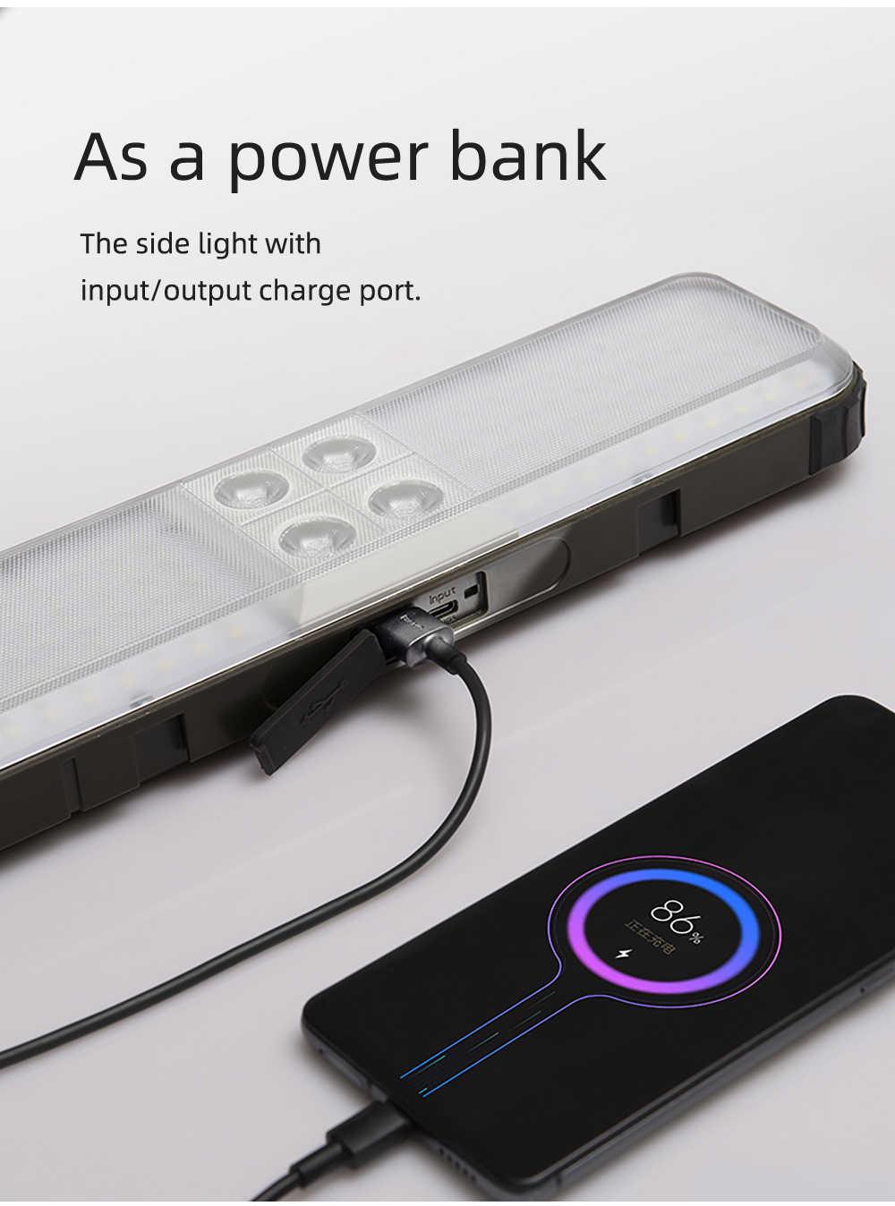 Power bank with charging cable connected to a smartphone on a light gray background
