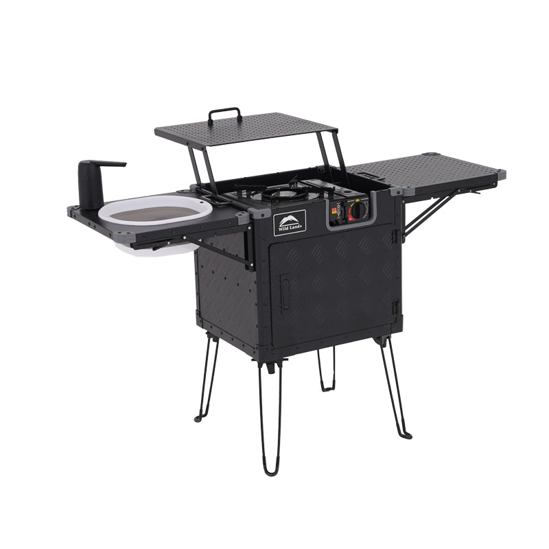 Black camping stove with cooktop and storage compartments on a white background
