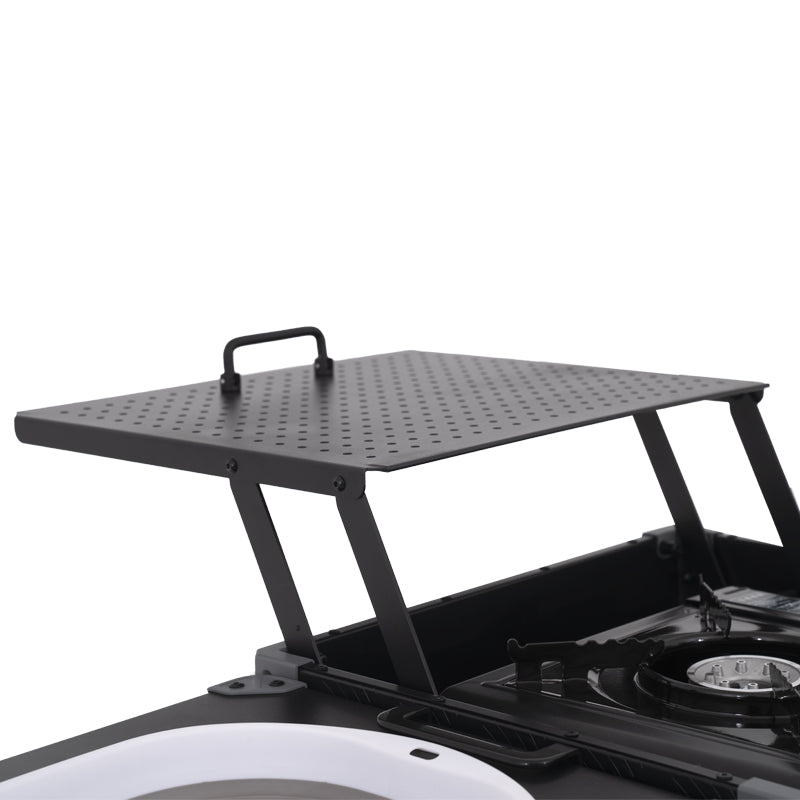 Close up view of portable camping stove with multiple burners on a white background