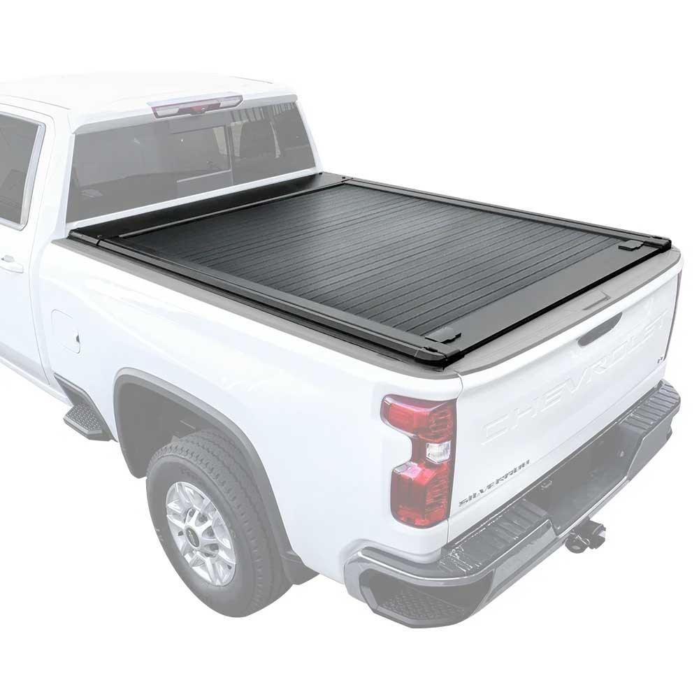 White truck with a black tonneau cover on a white background