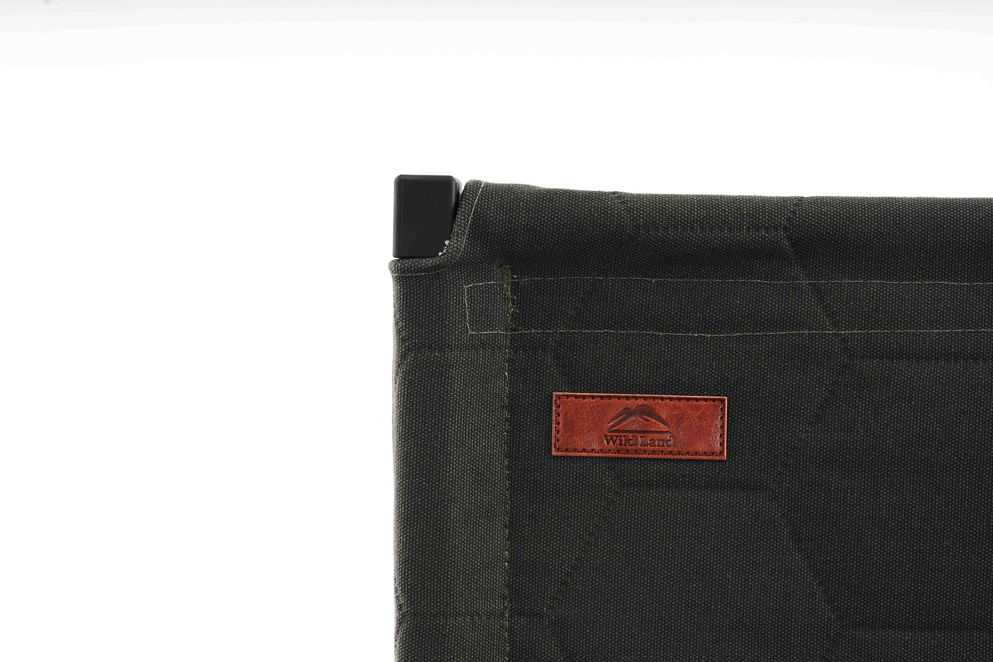 green fabric with a leather patch logo on a white background