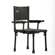 Black and green hunting chair with adjustable armrests on a white background