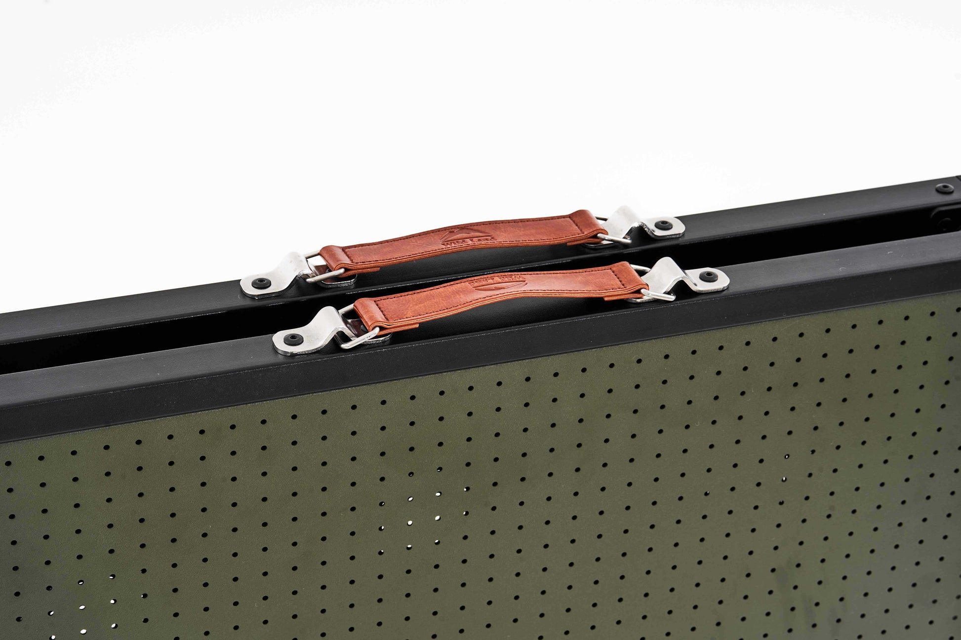 close-up view of two leather straps mts-c camping table