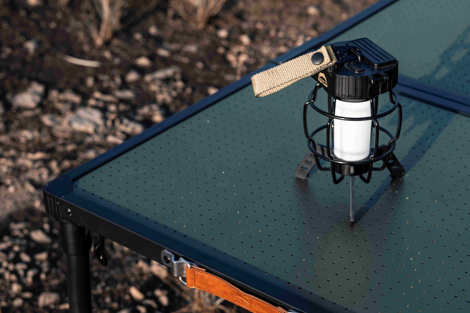 Camping lantern on a mts-c table outdoors