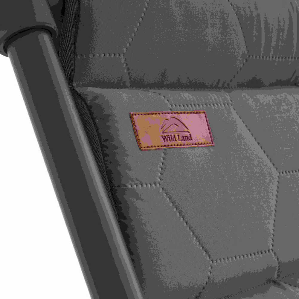 close up view on mts-x chair with leather 'Wild Land' logo tag.
