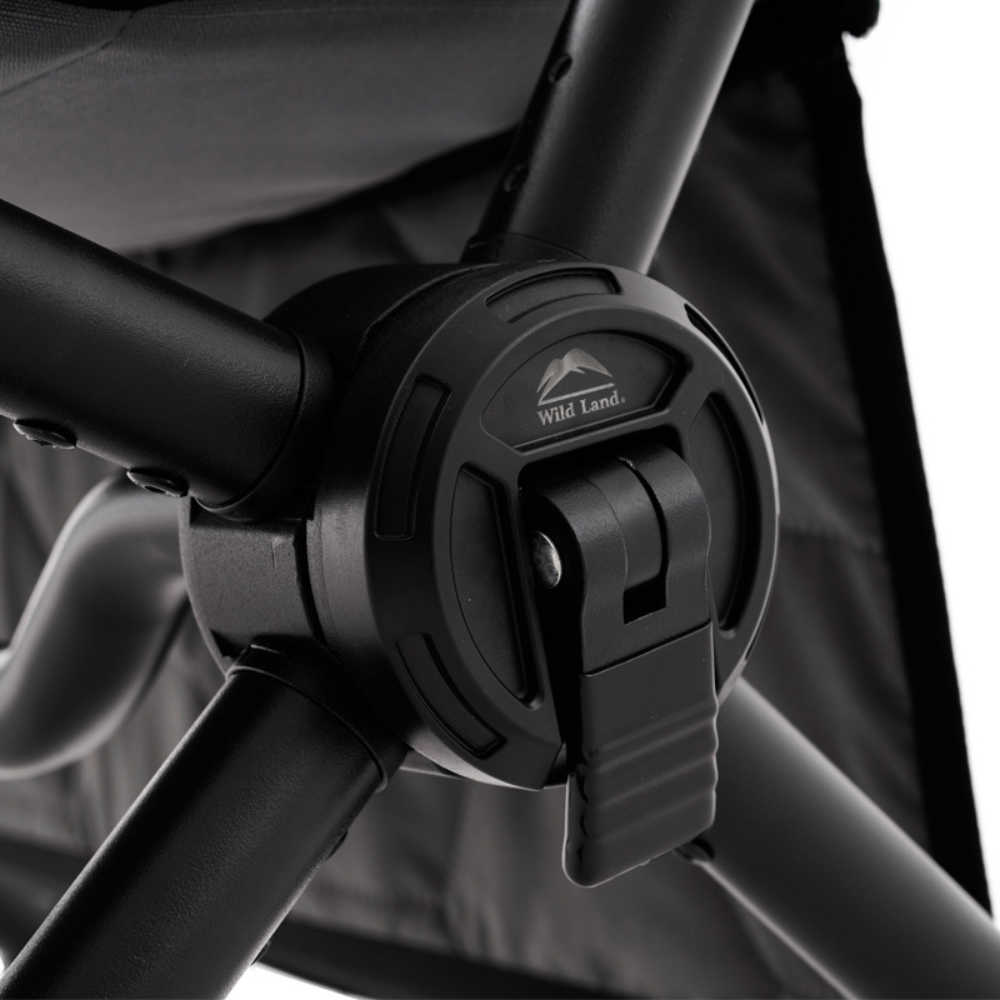 Close-up of a black stroller handle with a visible brand logo on a white background