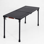 Black adjustable folding table on a white background