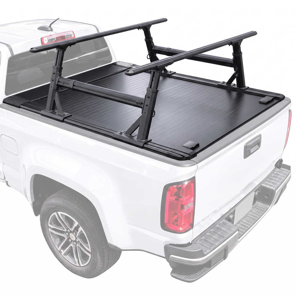 A manual tonneau cover with integrated R1 ladder rack mounted on the bed of a white pickup truck, shown from the rear three-quarter angle against a plain white background.